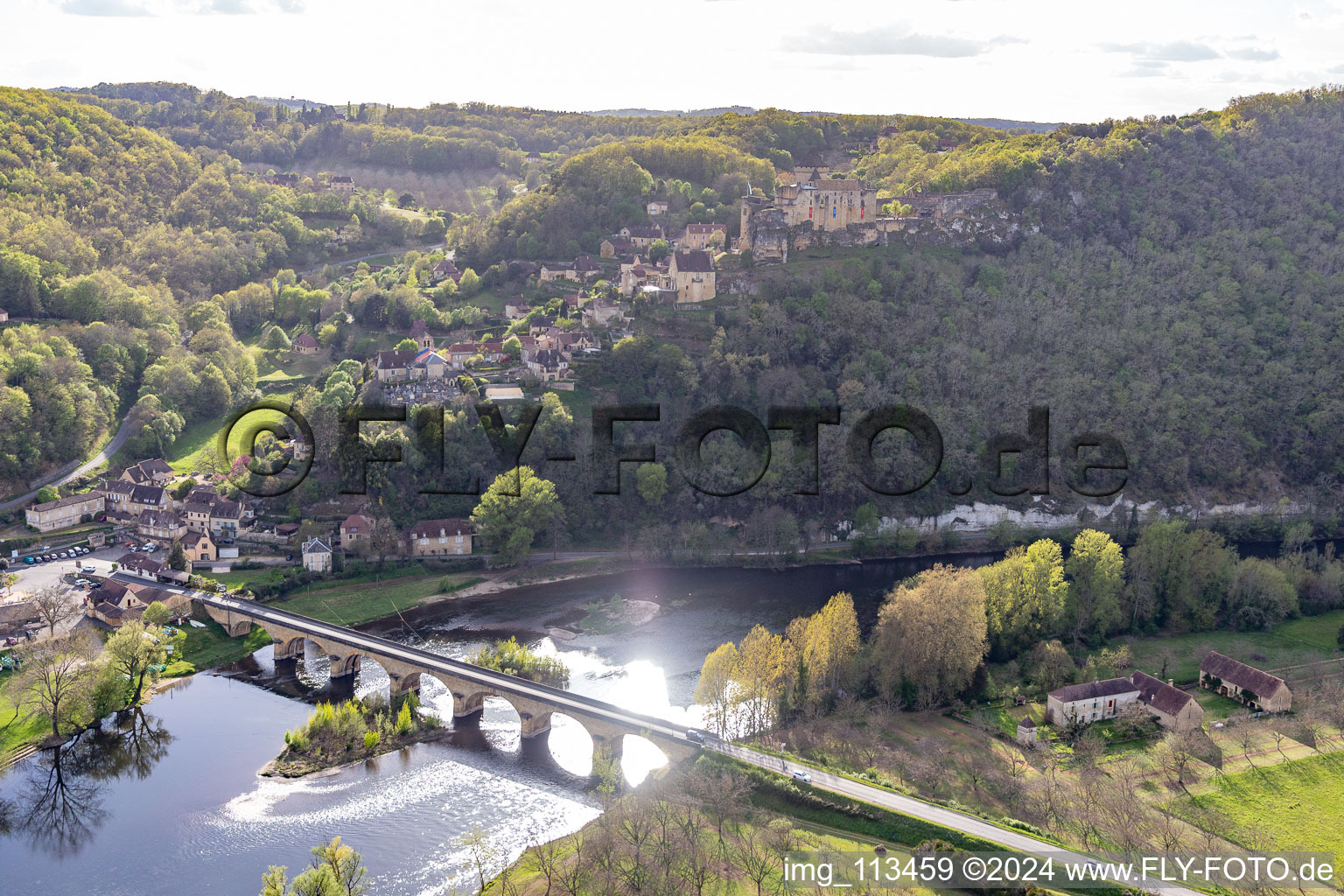 Aerial view of Dordogne Bridge under Chateau de Castelnaud-la Chapelle in Castelnaud-la-Chapelle in the state Dordogne, France