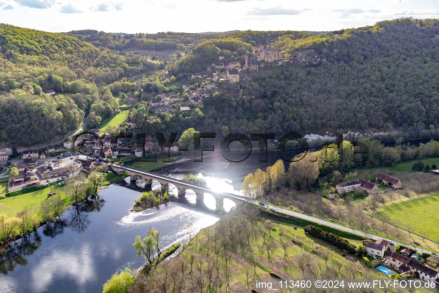 Aerial photograpy of Dordogne Bridge under Chateau de Castelnaud-la Chapelle in Castelnaud-la-Chapelle in the state Dordogne, France