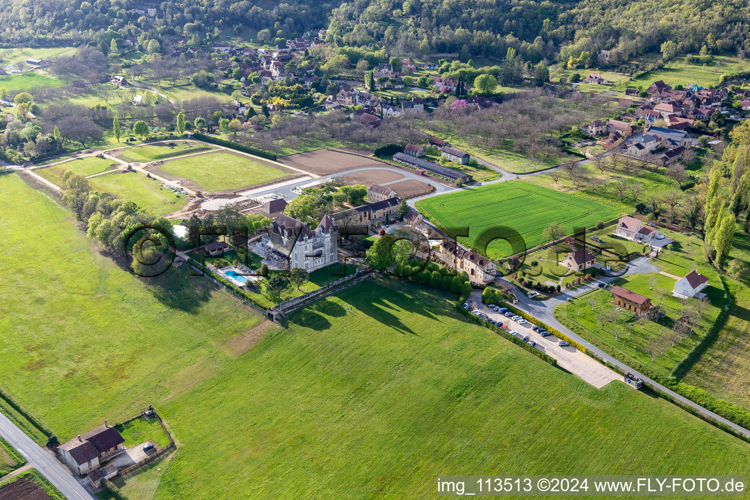 Aerial view of Chateau de Monrecour in Saint-Vincent-de-Cosse in the state Dordogne, France