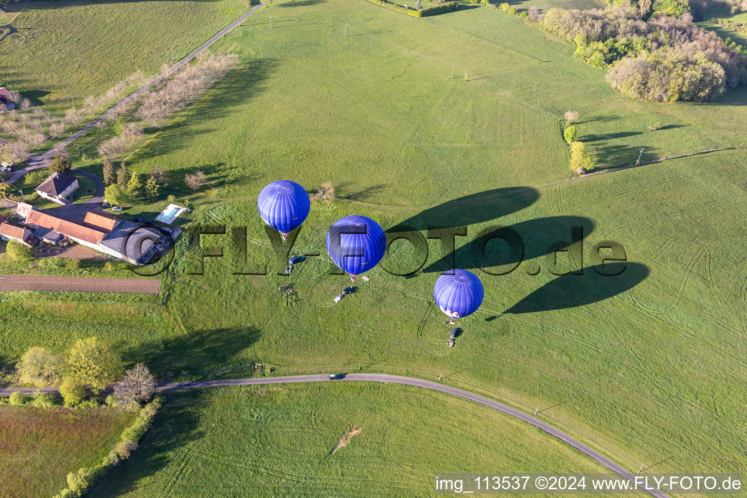 Aerial view of Hot air balloons launching over the airspace in Veyrines-de-Domme in Nouvelle-Aquitaine, France