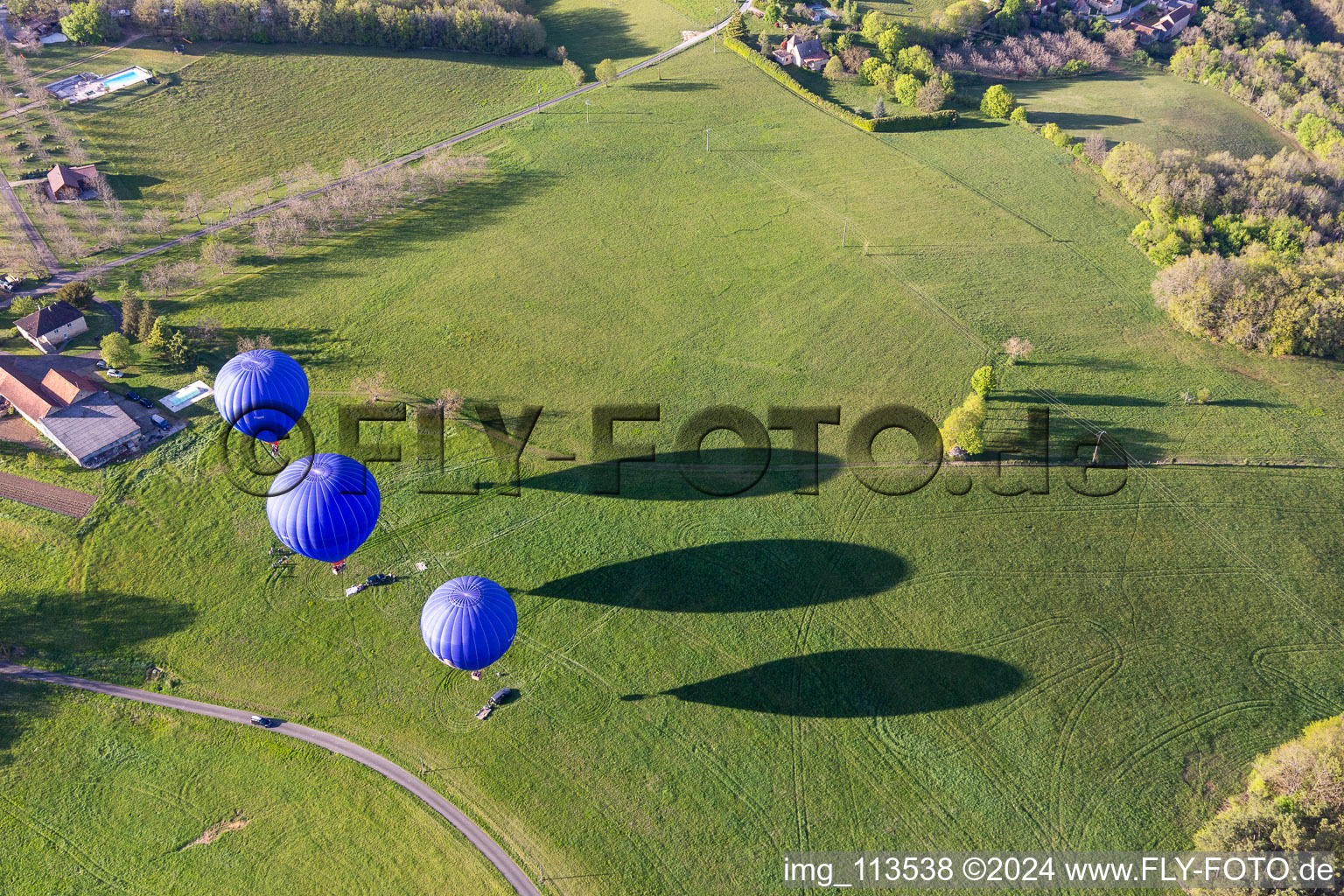 Aerial photograpy of Hot air balloons launching over the airspace in Veyrines-de-Domme in Nouvelle-Aquitaine, France