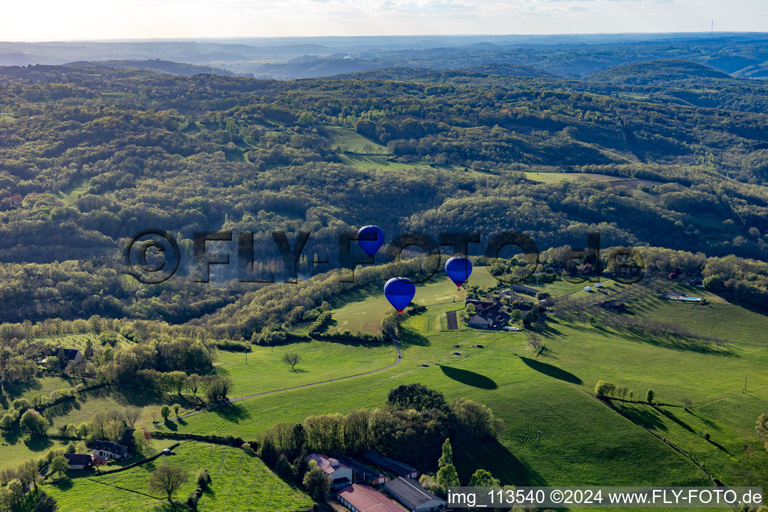 Balloon launch in Veyrines-de-Domme in the state Dordogne, France from above