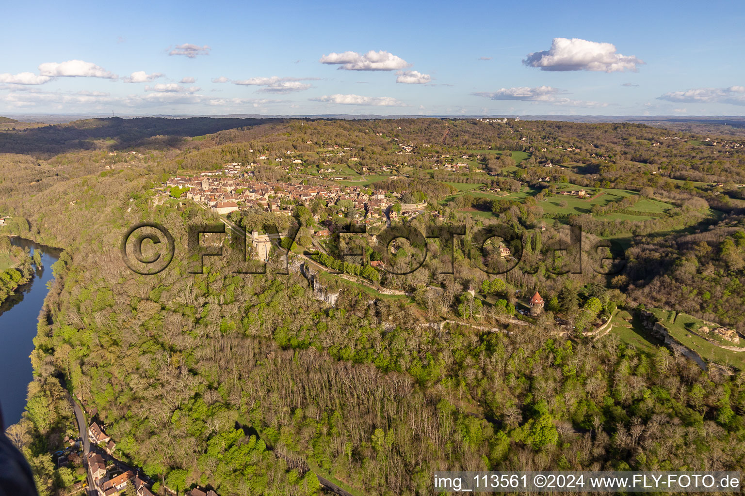 Town over the banks of the river Dordogne in Domme in Nouvelle-Aquitaine, France