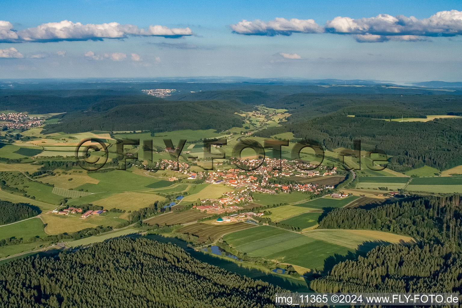 Village - view on the edge of agricultural fields and farmland in Talheim in the state Baden-Wurttemberg, Germany