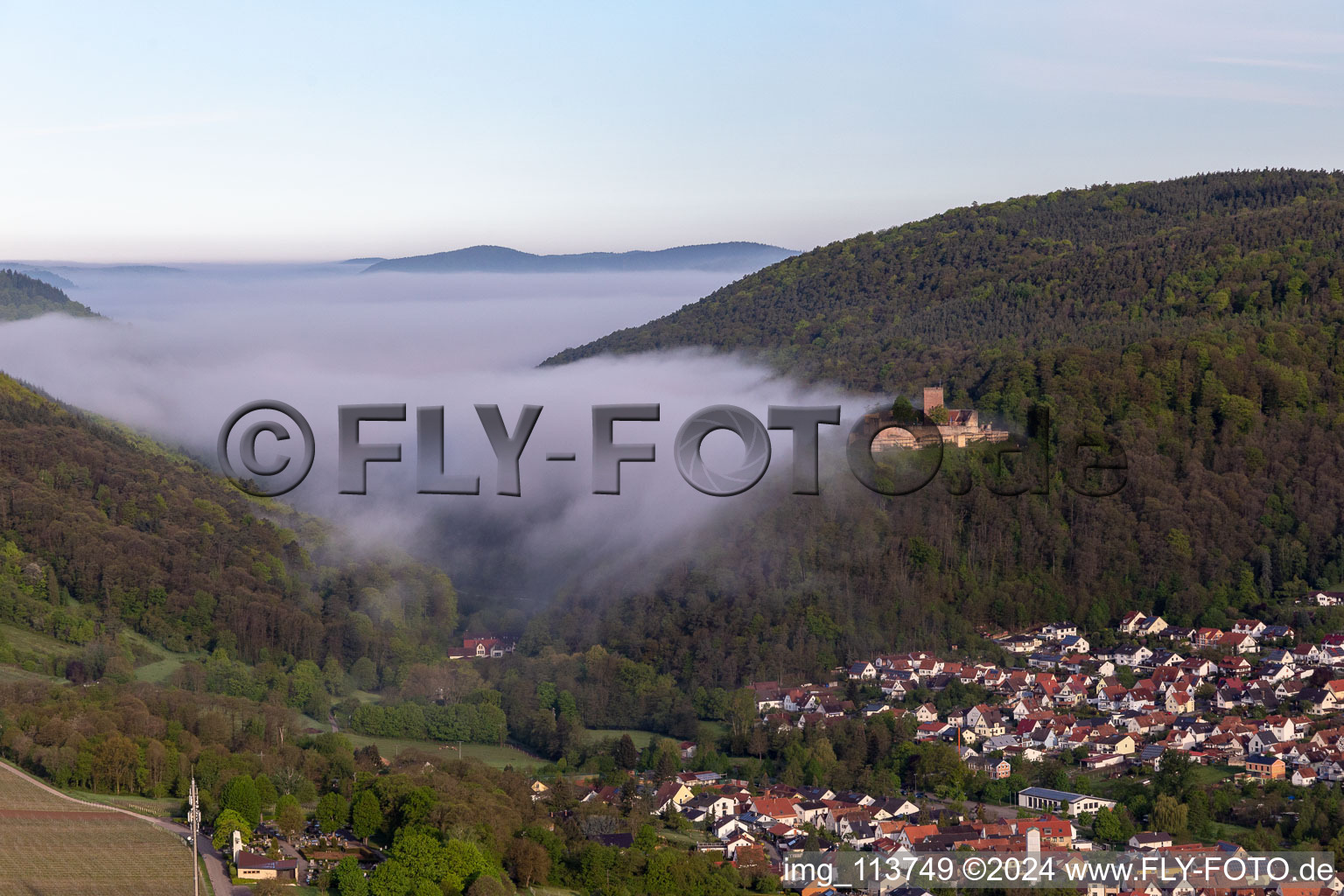 Aerial photograpy of Landeck Castle in the morning fog in Klingenmünster in the state Rhineland-Palatinate, Germany