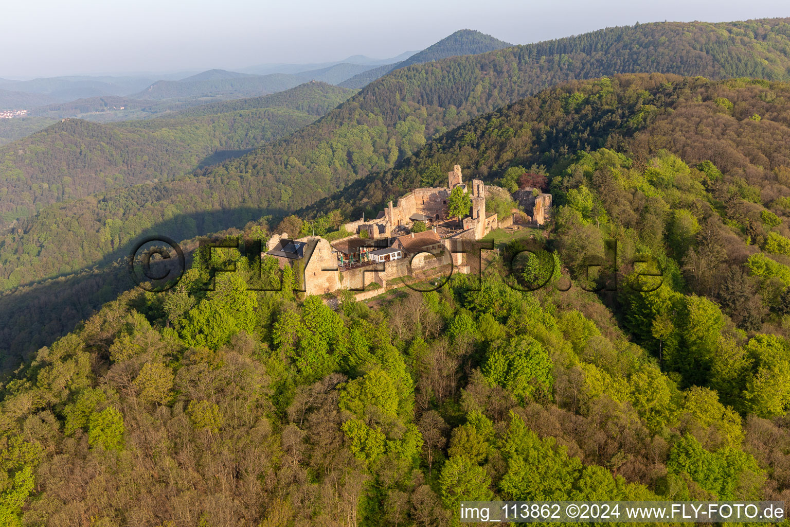 Aerial view of Ruins and vestiges of the former castle and fortress Burgruine Madenburg in Eschbach in the state Rhineland-Palatinate