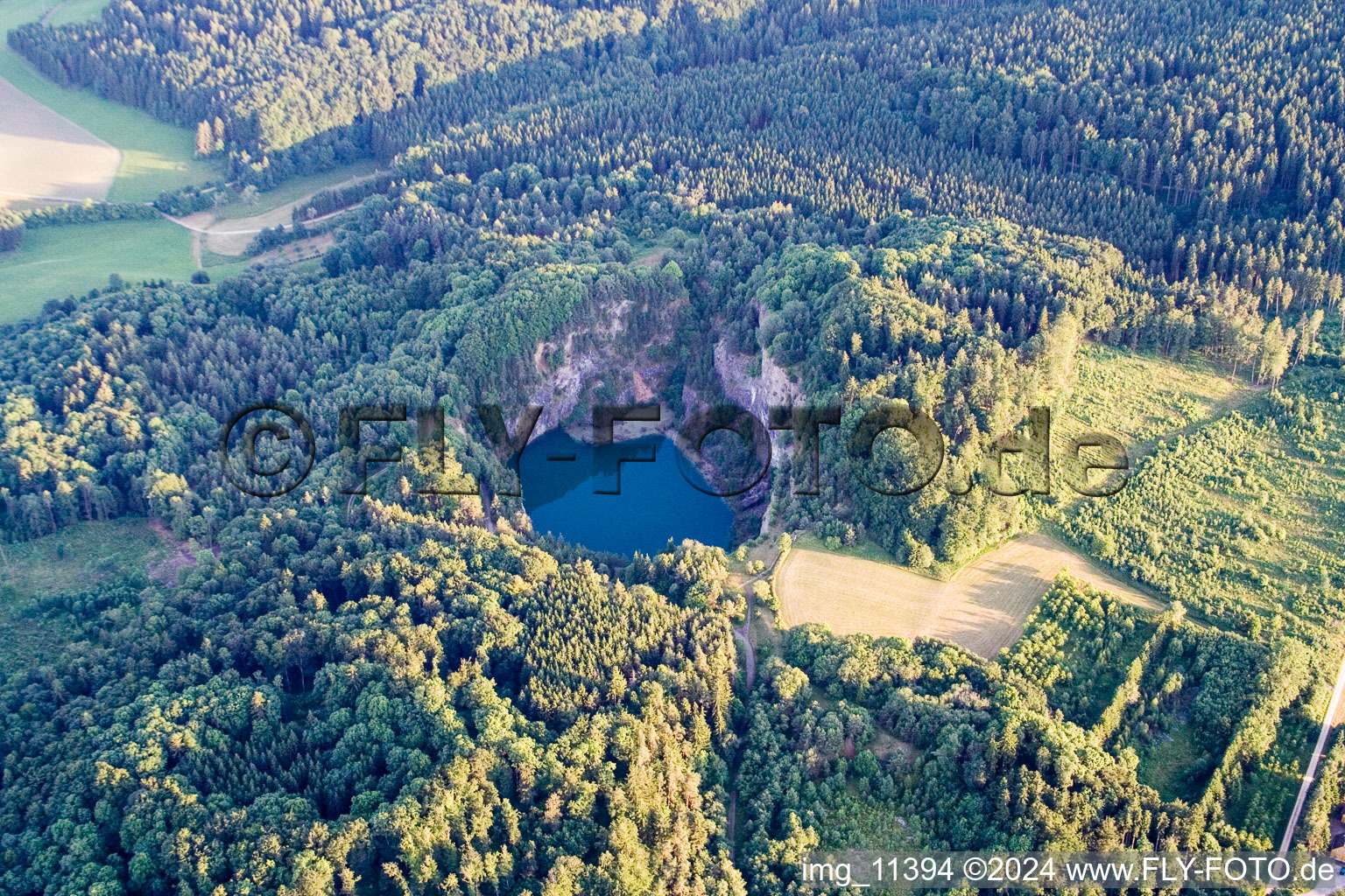 Steep riparian areas with forest on the lake area of Hoewenegg in Immendingen in the state Baden-Wurttemberg