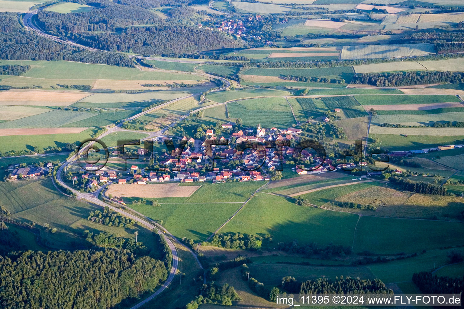 Village - view on the edge of agricultural fields and farmland in the district Mauenheim in Immendingen in the state Baden-Wurttemberg