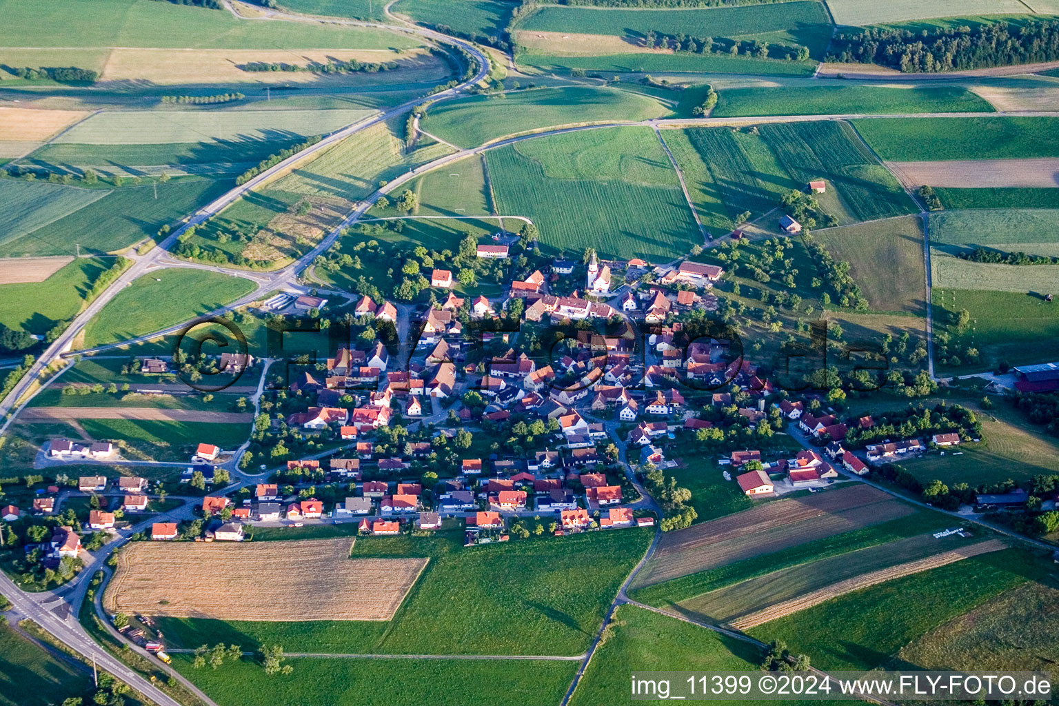 Aerial view of Village - view on the edge of agricultural fields and farmland in the district Mauenheim in Immendingen in the state Baden-Wurttemberg