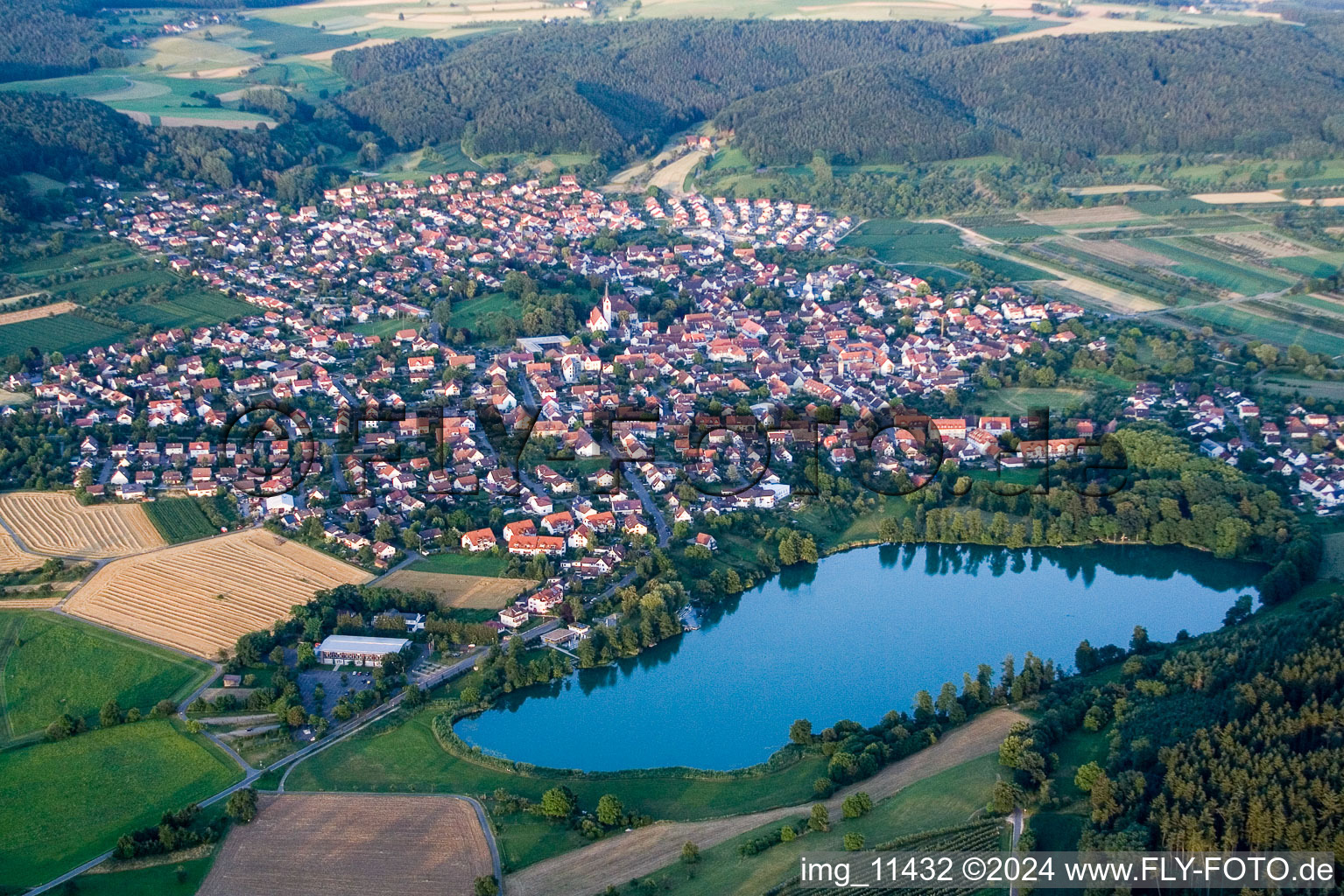 Village on the lake bank areas des Steisslingen See in Steisslingen in the state Baden-Wurttemberg