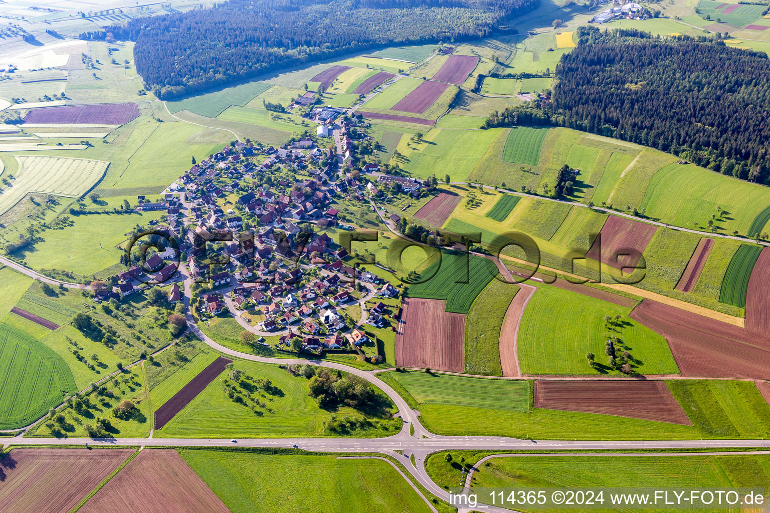 Agricultural land and field borders surround the settlement area of the village in Durrweiler in the state Baden-Wurttemberg, Germany