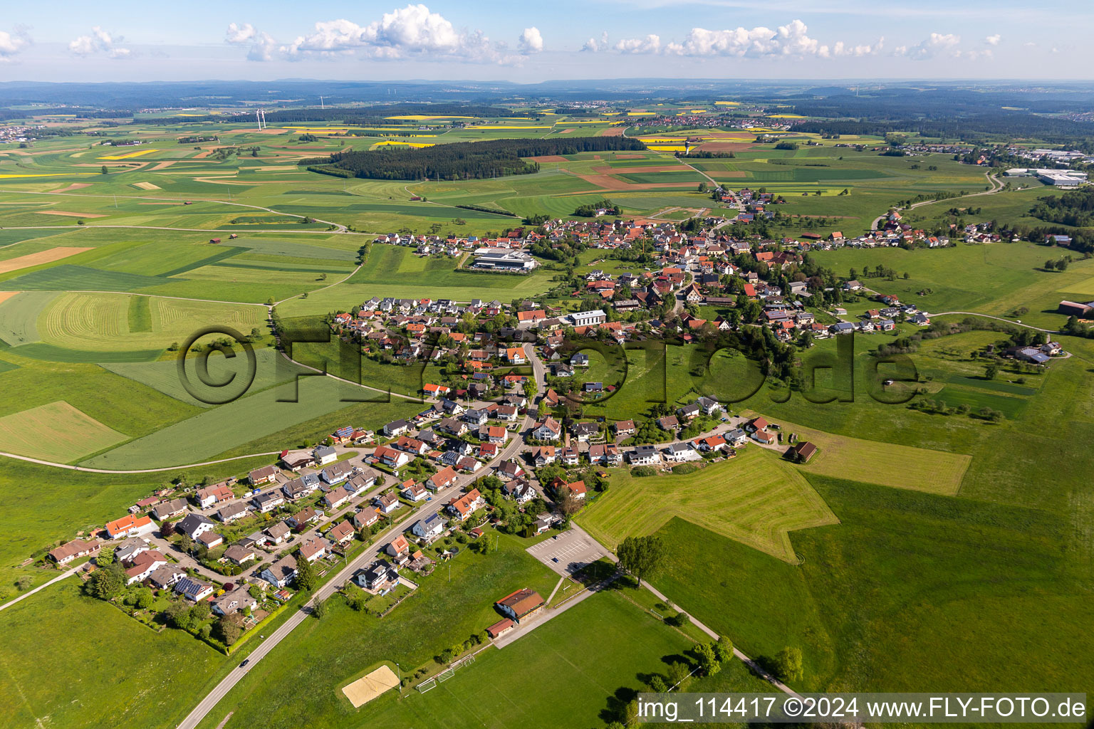 Agricultural land and field borders surround the settlement area of the village in Beffendorf in the state Baden-Wurttemberg, Germany