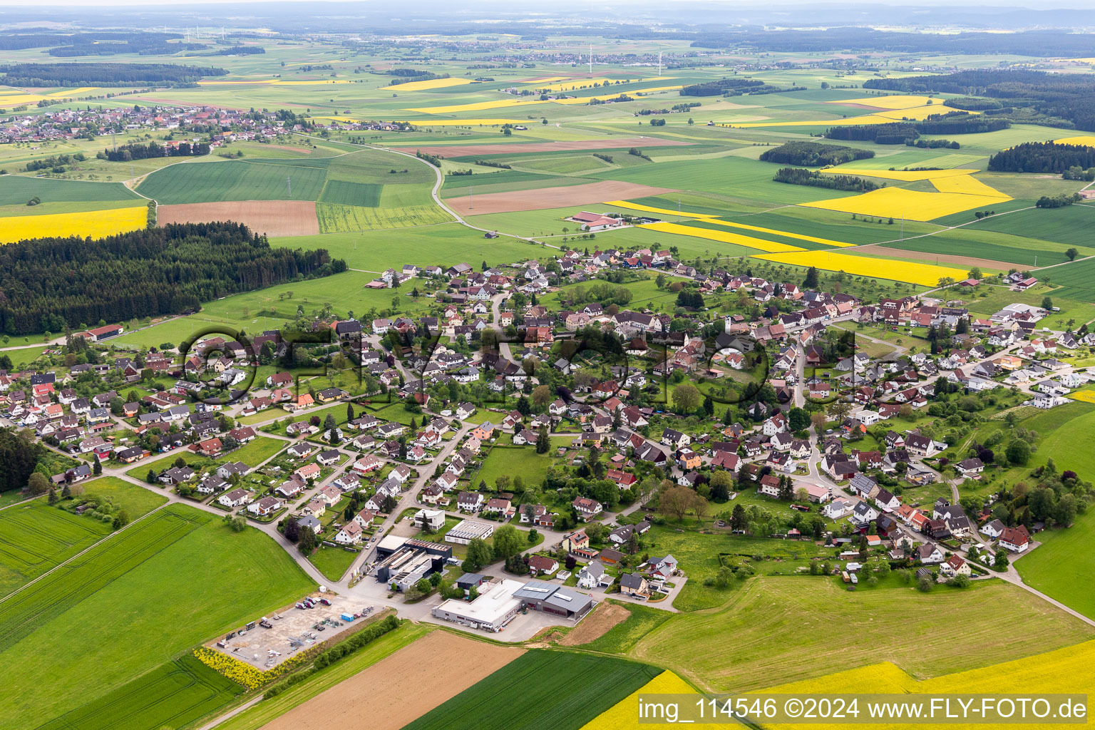 Agricultural land and field borders surround the settlement area of the village in Dornhan in the state Baden-Wurttemberg, Germany