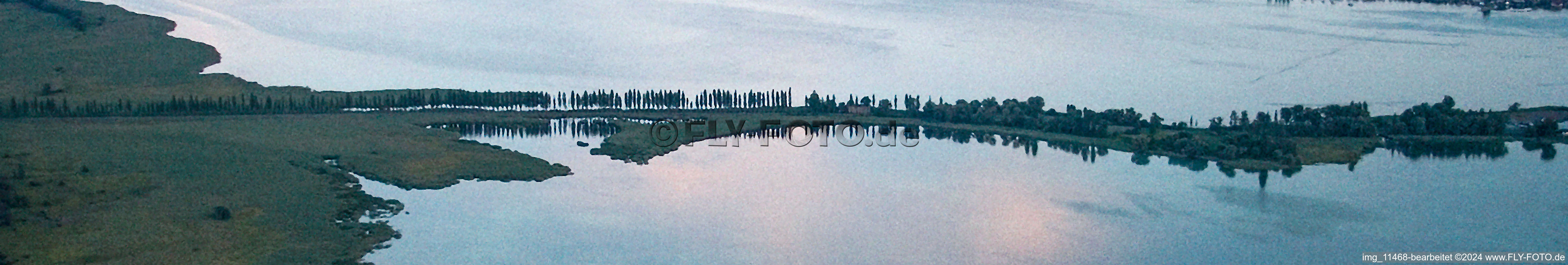 Bridge to the Island Reichenau on the Lake of Constance during sunset in Reichenau in the state Baden-Wurttemberg