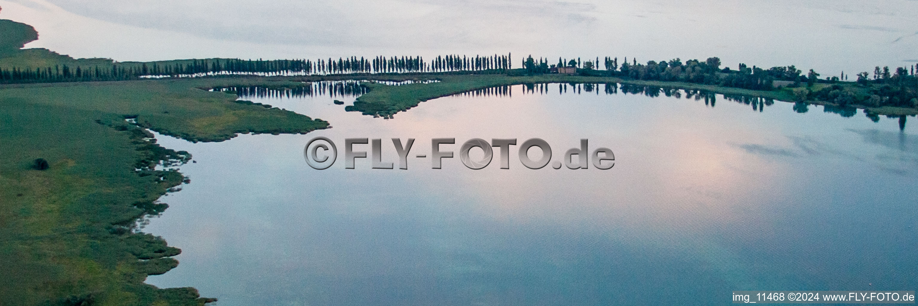 Pier to the lake island Reichenau between Untersee and Gnadensee on Lake Constance in the evening light in the district Lindenbühl in Reichenau in the state Baden-Wuerttemberg, Germany