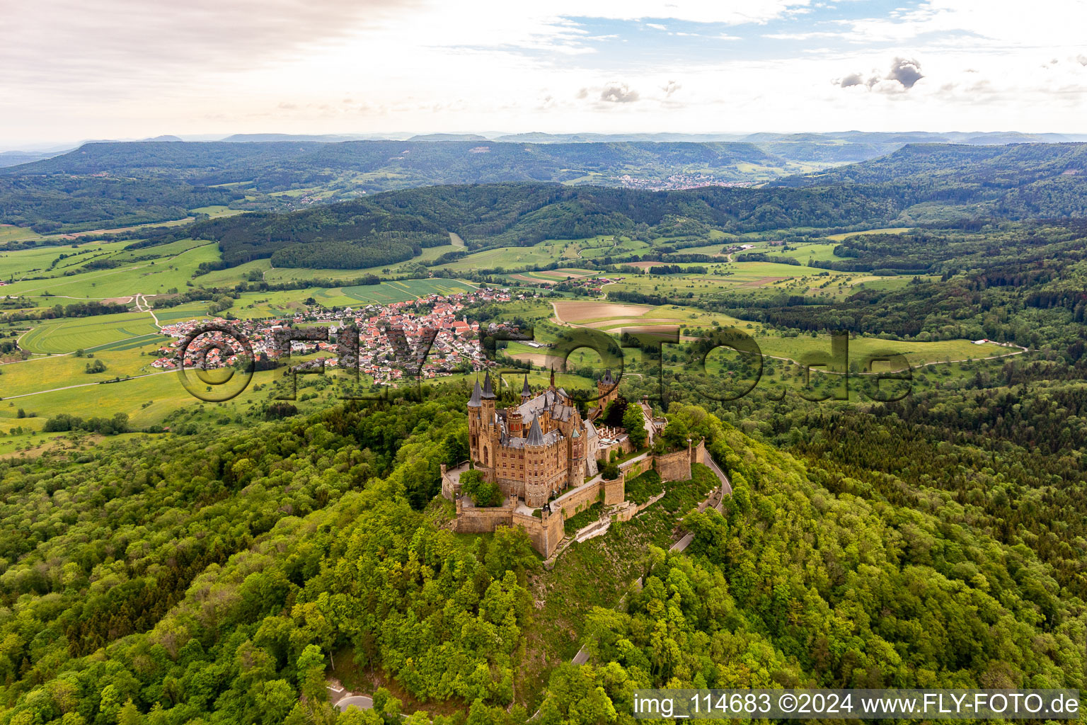 Hohenzollern Castle in the district Zimmern in Bisingen in the state Baden-Wuerttemberg, Germany from the drone perspective