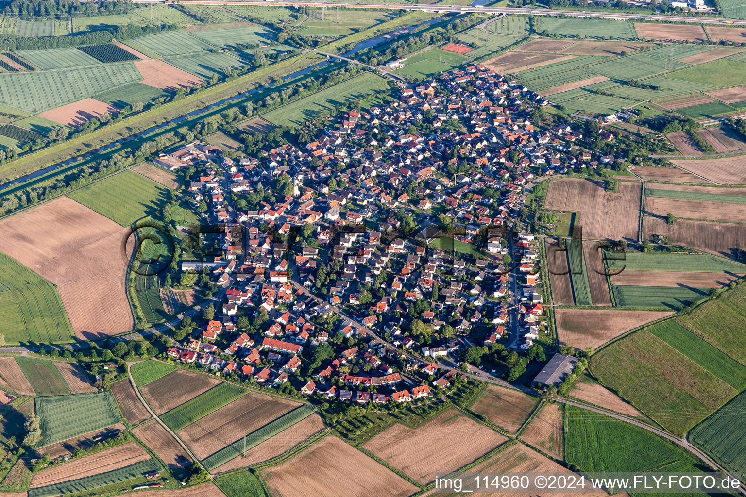 Agricultural land and field borders surround the settlement area of the village in Griesheim in the state Baden-Wurttemberg, Germany