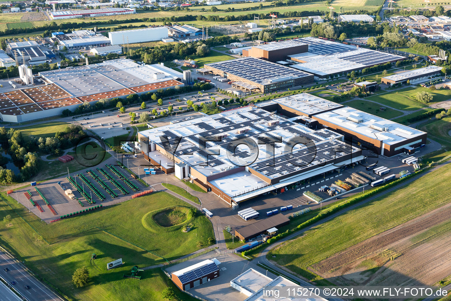 Buildings and production halls on the vehicle construction site of John Deere GmbH & Co. KG on John-Deere-Strasse in the district Untergrombach in Bruchsal in the state Baden-Wurttemberg, Germany