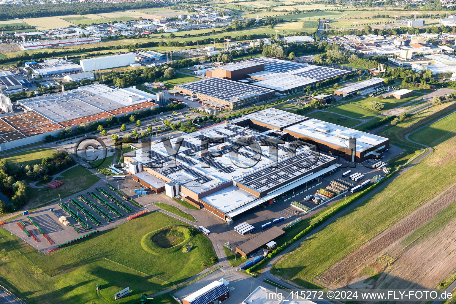 Aerial view of Buildings and production halls on the vehicle construction site of John Deere GmbH & Co. KG on John-Deere-Strasse in the district Untergrombach in Bruchsal in the state Baden-Wurttemberg, Germany