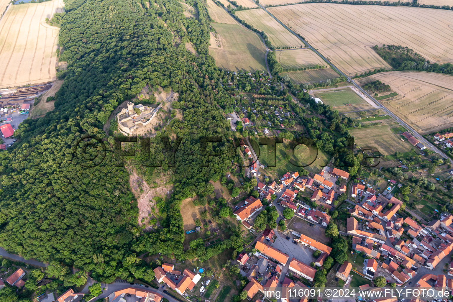 Aerial view of Ruins and vestiges of the former castle and fortress Muehlburg in the district Muehlberg in Drei Gleichen in the state Thuringia, Germany