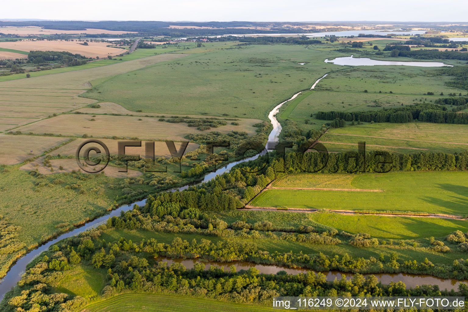 Channel flow and river banks of the waterway shipping canal between Ober- and Unteruckersee in Seeluebbe in the state Brandenburg, Germany