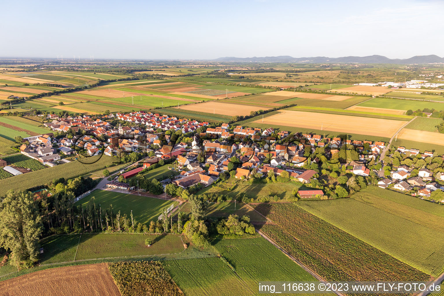 Aerial view of Village - view on the edge of agricultural fields and farmland in the district Moerlheim in Landau in der Pfalz in the state Rhineland-Palatinate, Germany