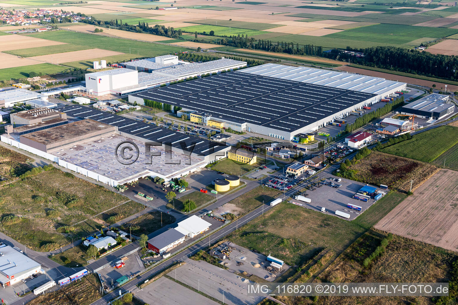 Aerial photograpy of High-bay warehouse building complex and logistics center on the premises of Merceof Benz Spare Part storage in Offenbach an der Queich in the state Rhineland-Palatinate, Germany