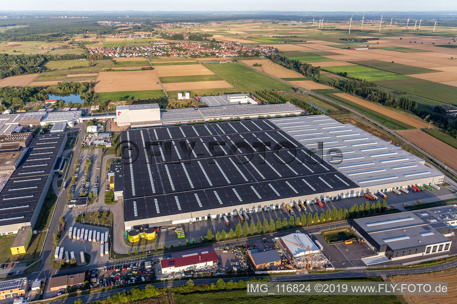 Oblique view of High-bay warehouse building complex and logistics center on the premises of Merceof Benz Spare Part storage in Offenbach an der Queich in the state Rhineland-Palatinate, Germany