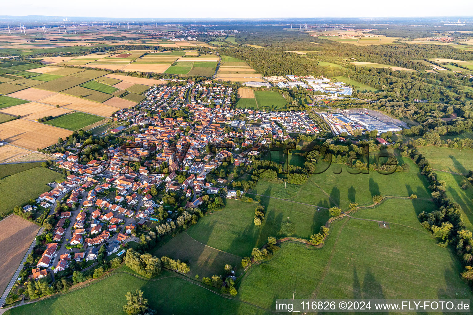 Village - view on the edge of agricultural fields and farmland in Rohrbach in the state Rhineland-Palatinate, Germany out of the air