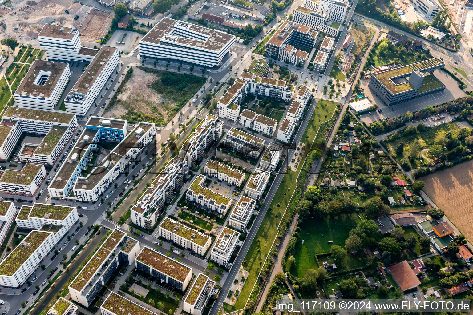 Aerial photograpy of Residential area of the multi-family house settlement on Marie-Baum-Strasse - Gruene Meile - Eppelheimer Strasse in the district Bahnstadt in Heidelberg in the state Baden-Wurttemberg, Germany