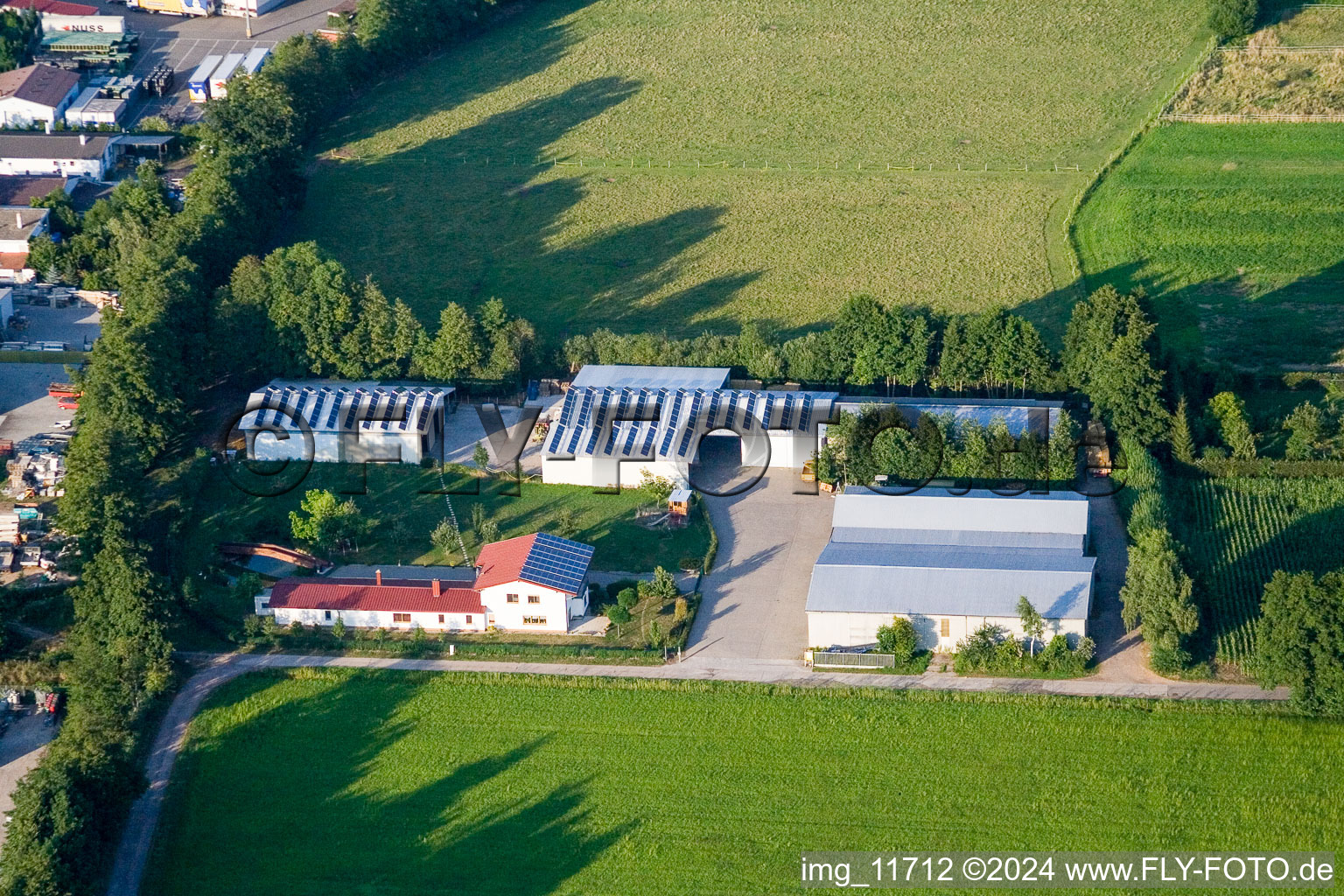 In the Rötzwiesen, Hof Fam. Kerth in the district Minderslachen in Kandel in the state Rhineland-Palatinate, Germany viewn from the air