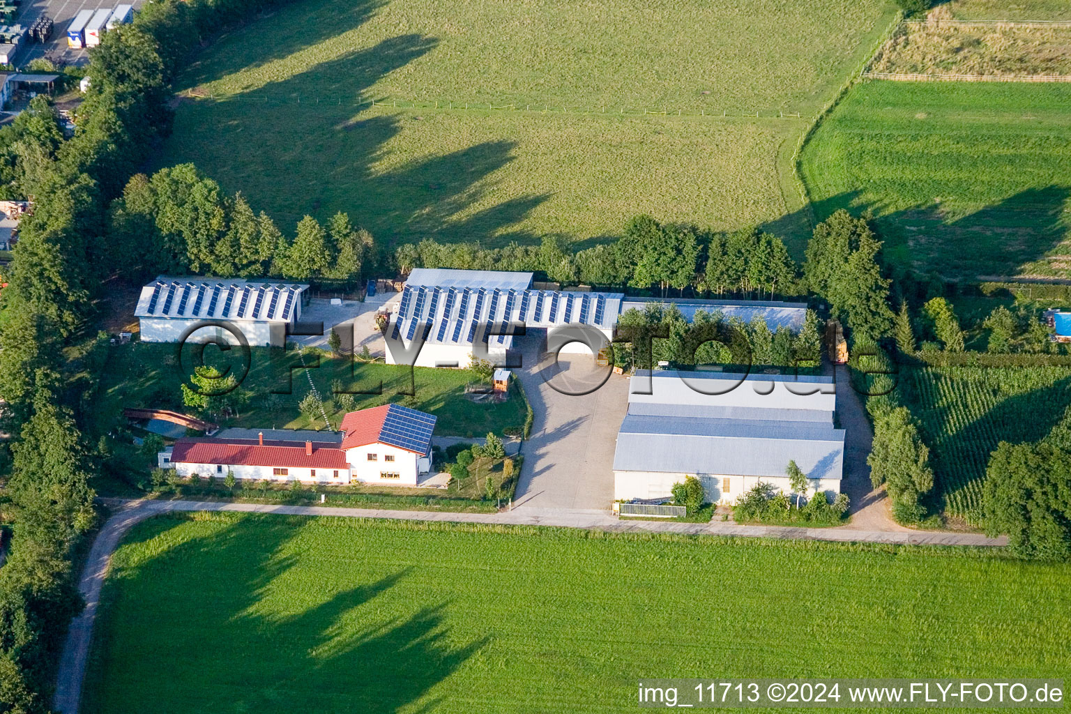 Drone recording of In the Rötzwiesen, Hof Fam. Kerth in the district Minderslachen in Kandel in the state Rhineland-Palatinate, Germany