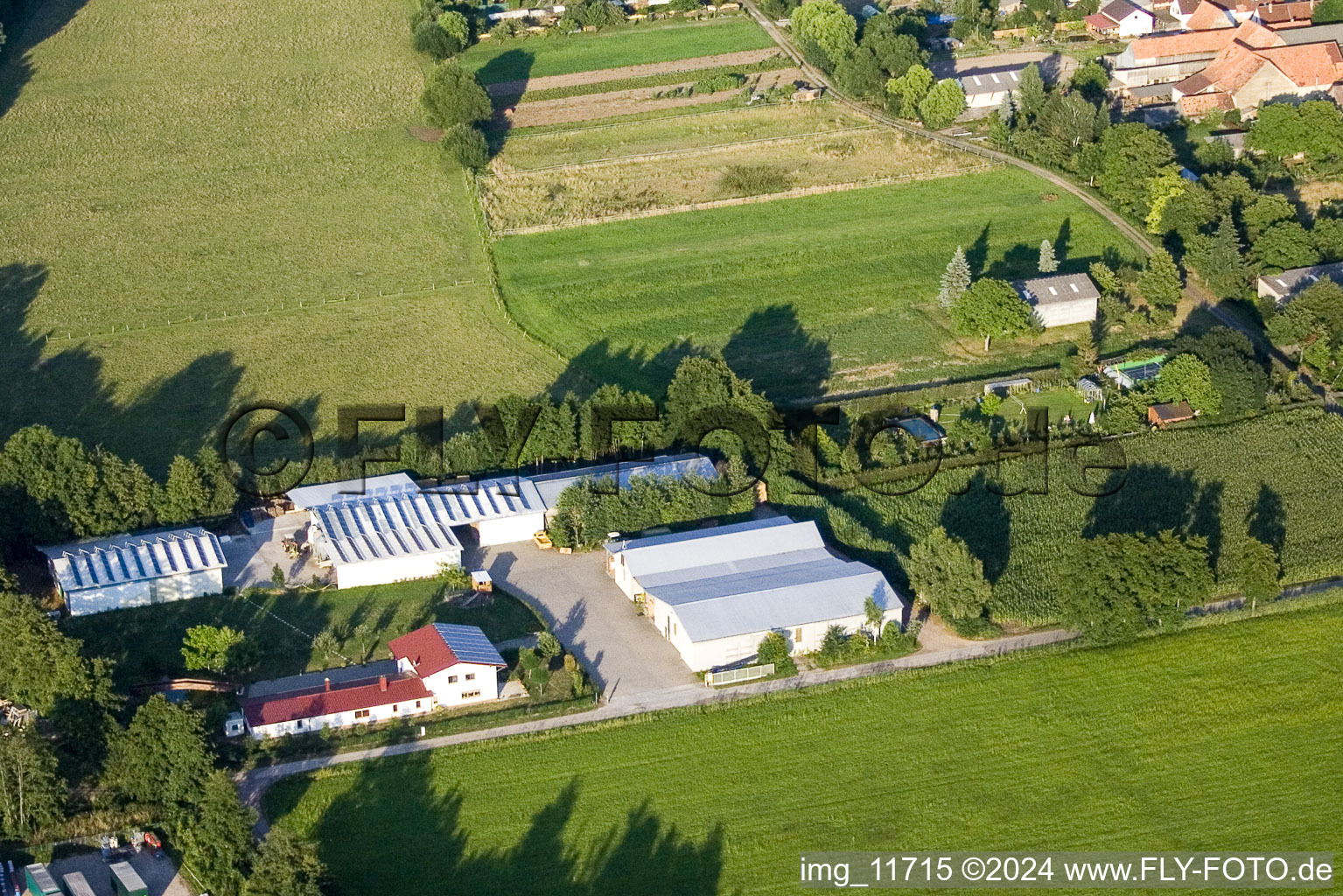 In the Rötzwiesen, Hof Fam. Kerth in the district Minderslachen in Kandel in the state Rhineland-Palatinate, Germany from the drone perspective