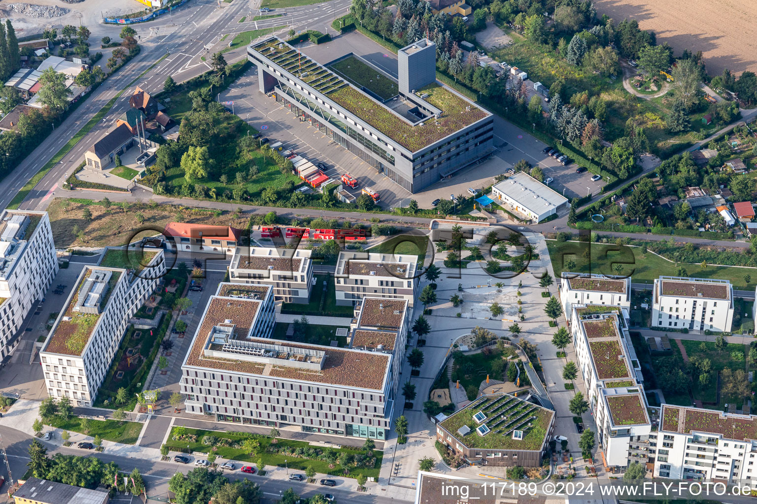 Office building of Deutsche Wohnwerte GmbH & Co. KG in front of the fire brigade centre in the district Bahnstadt in Heidelberg in the state Baden-Wurttemberg, Germany