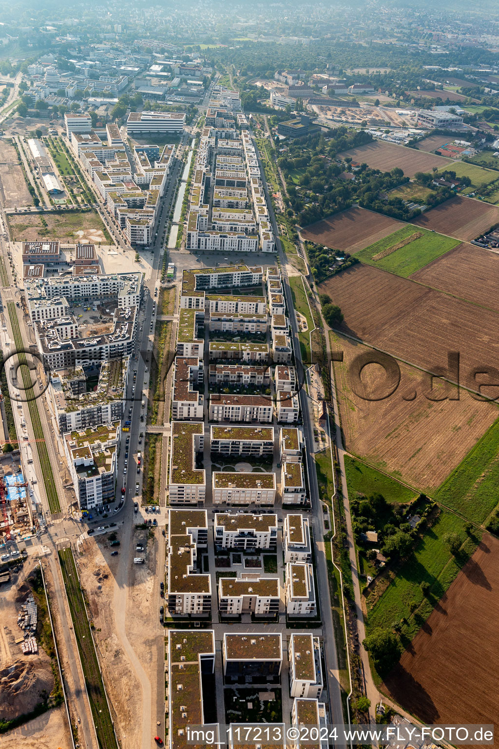 Residential area of the multi-family house settlement on Marie-Baum-Strasse - Gruene Meile - Eppelheimer Strasse in the district Bahnstadt in Heidelberg in the state Baden-Wurttemberg, Germany from the plane