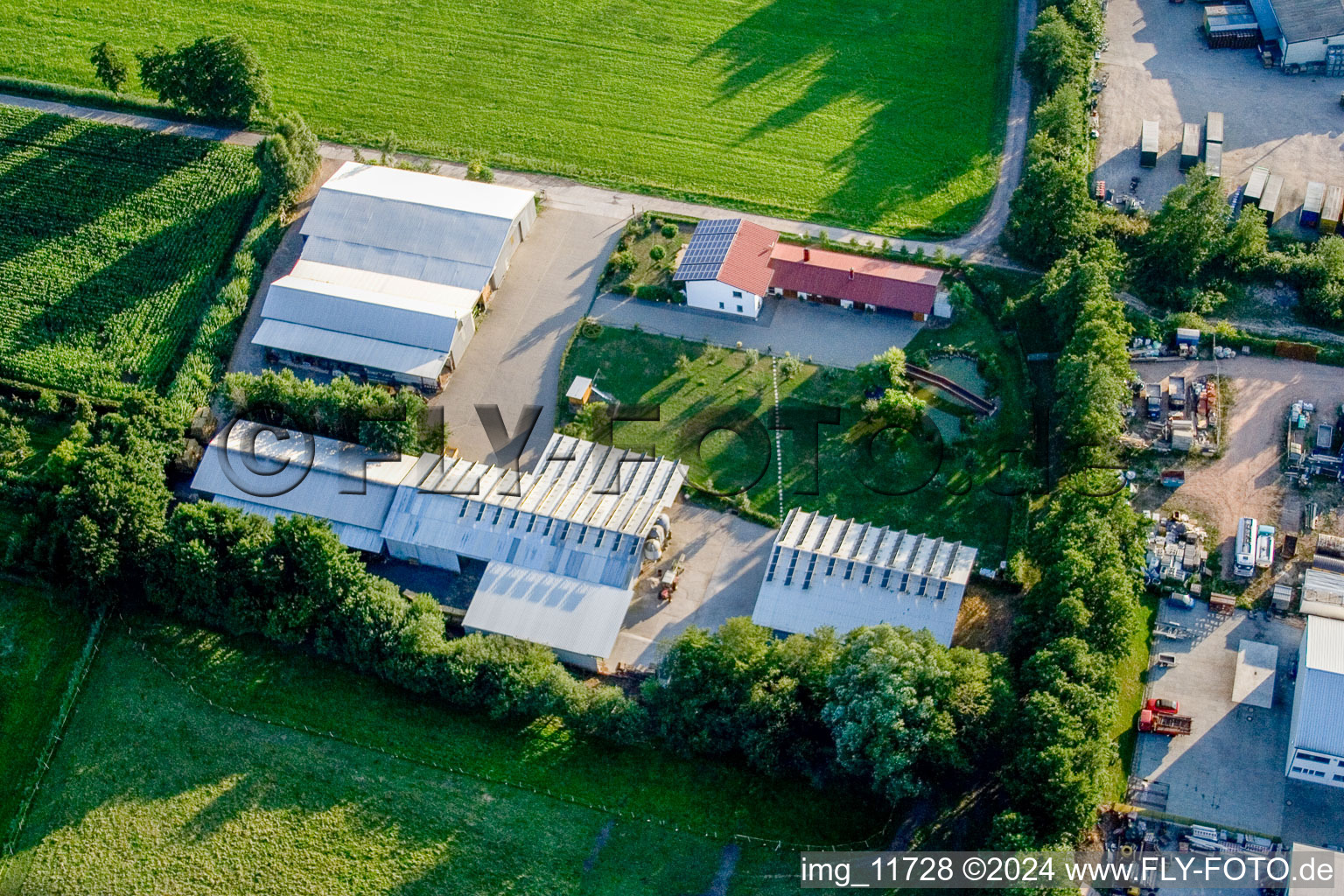 In the Rötzwiesen, Hof Fam. Kerth in the district Minderslachen in Kandel in the state Rhineland-Palatinate, Germany from above