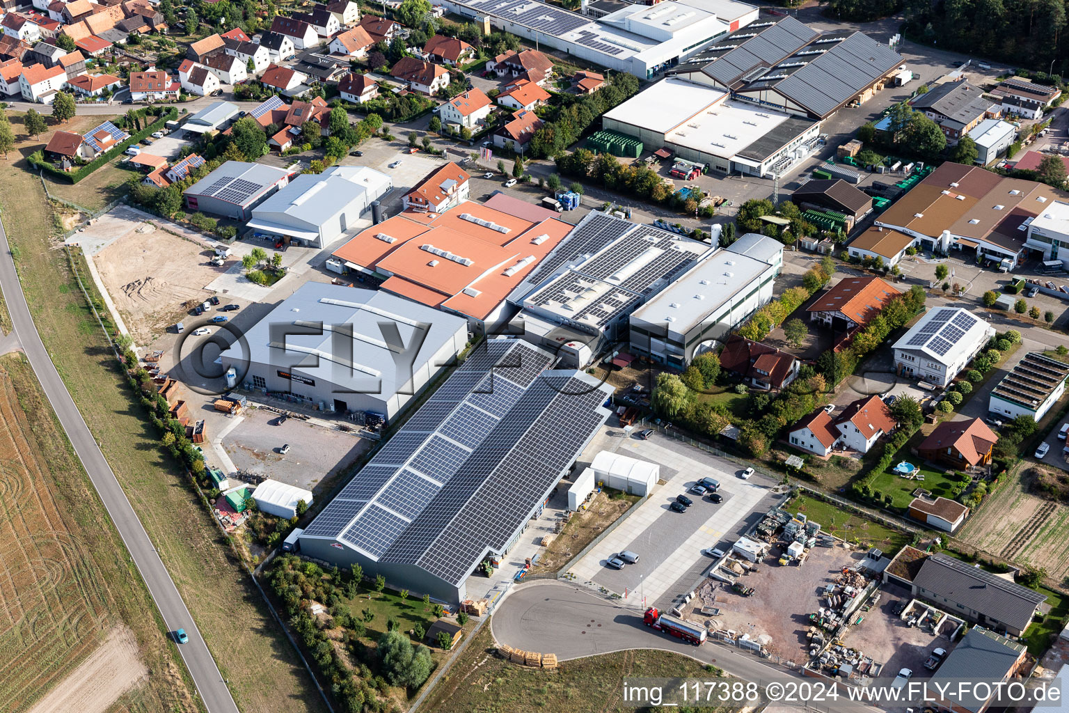 Oblique view of Im Gereut industrial estate, HGGS LaserCUT GmbH & Co. KG in Hatzenbühl in the state Rhineland-Palatinate, Germany