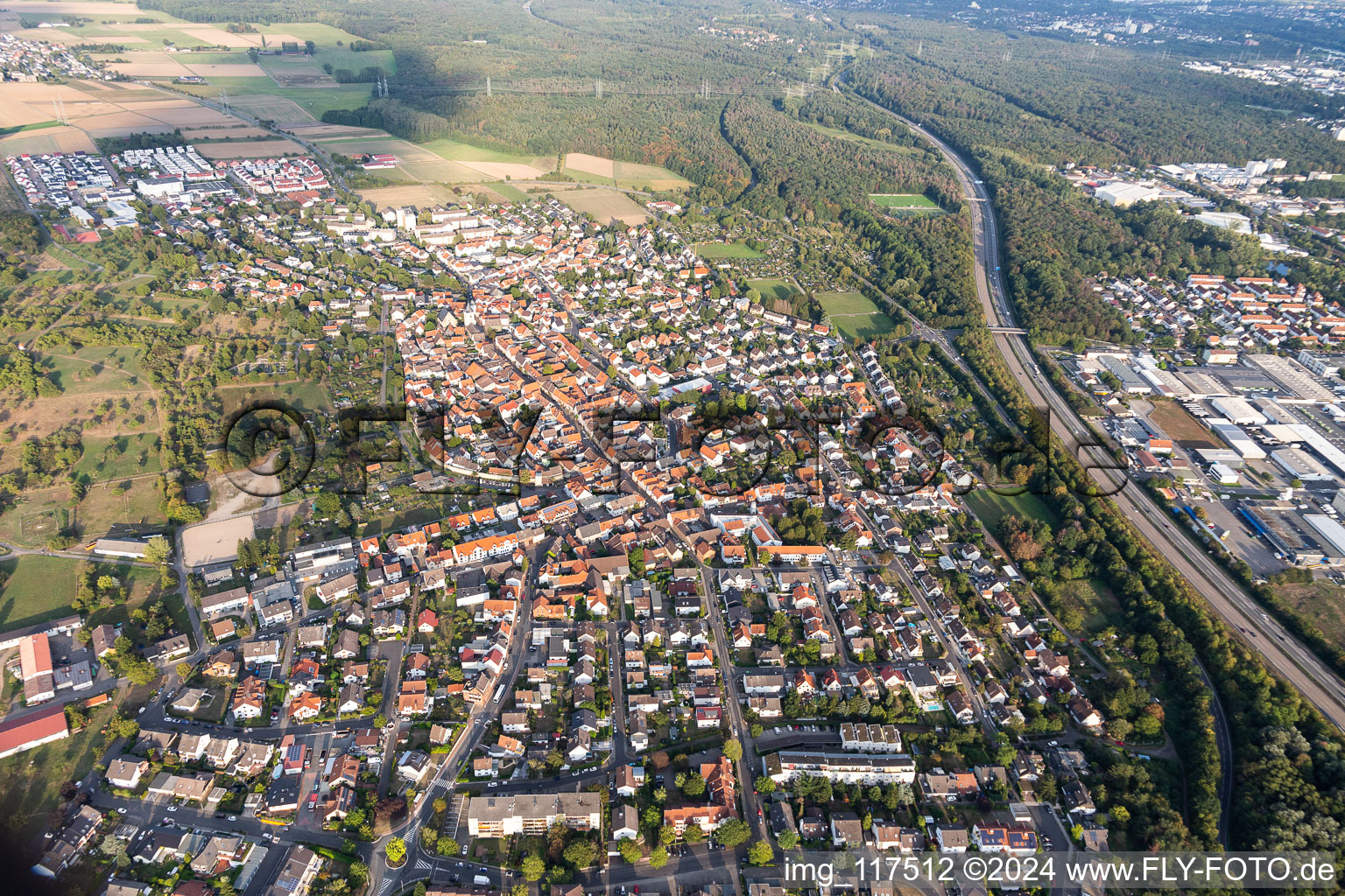 Aerial view of Town View of the streets and houses of the residential areas in Hochstadt in the state Hesse, Germany