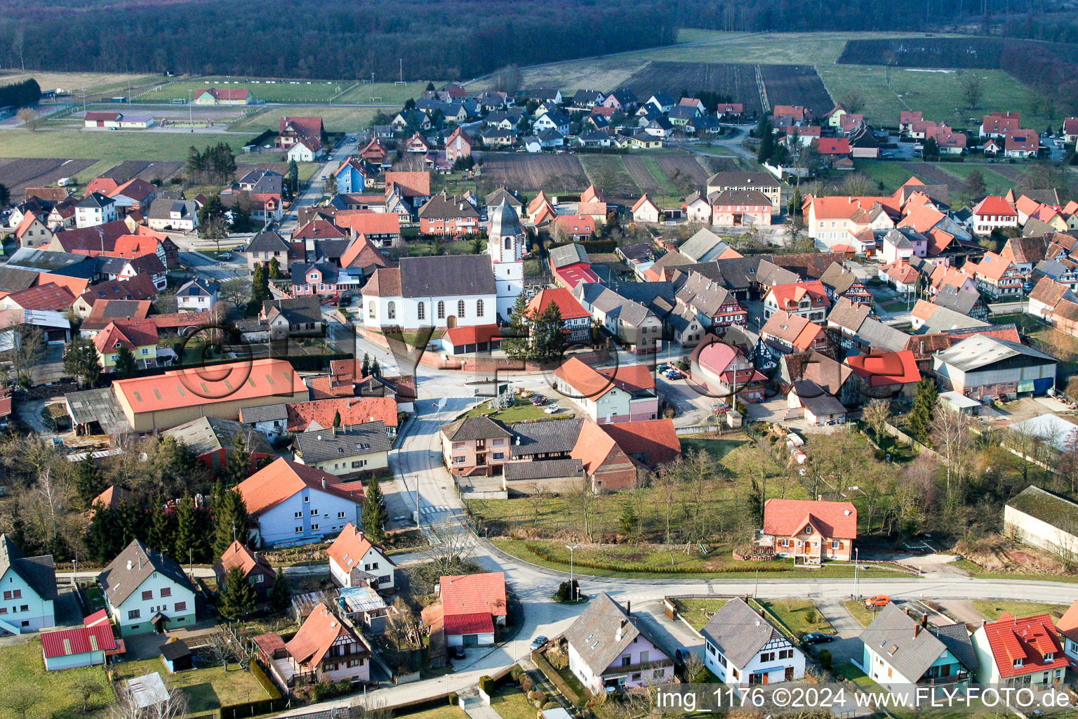 Aerial view of Church building in the village of in Niederlauterbach in Grand Est, France