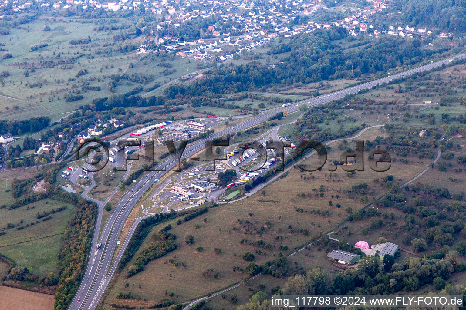 Aerial view of Lorries - parking spaces at the highway rest stop and parking of the A4 Aire de Service AVIA de Saverne-Eckartswiller in Eckartswiller in Grand Est, France