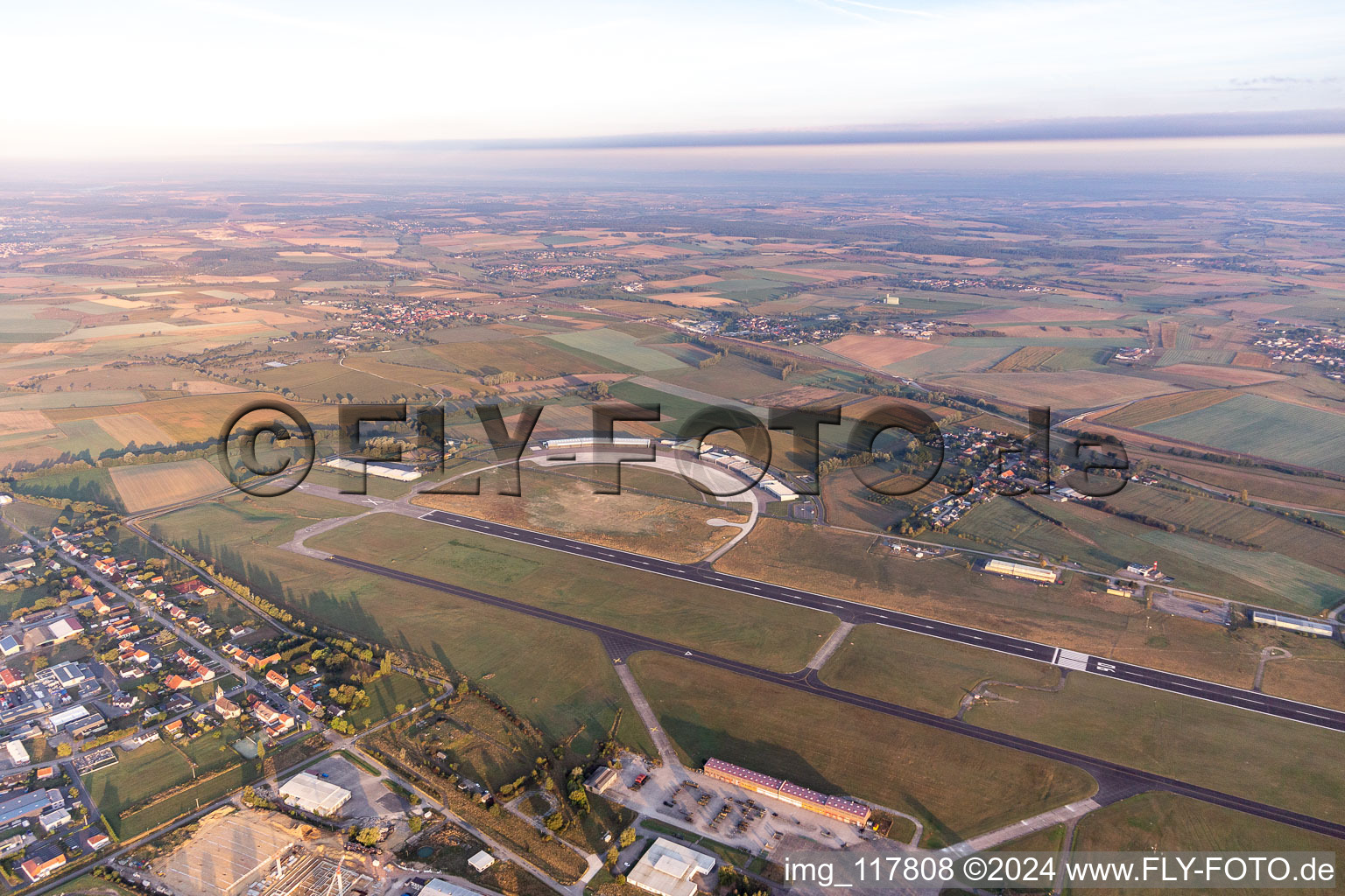 Aerial photograpy of Buildings and runway with tarmac of the Phalsbourg-Bourscheid military airfield "Camp LA Horie" in Saint-Jean-Kourtzerode in Grand Est, France