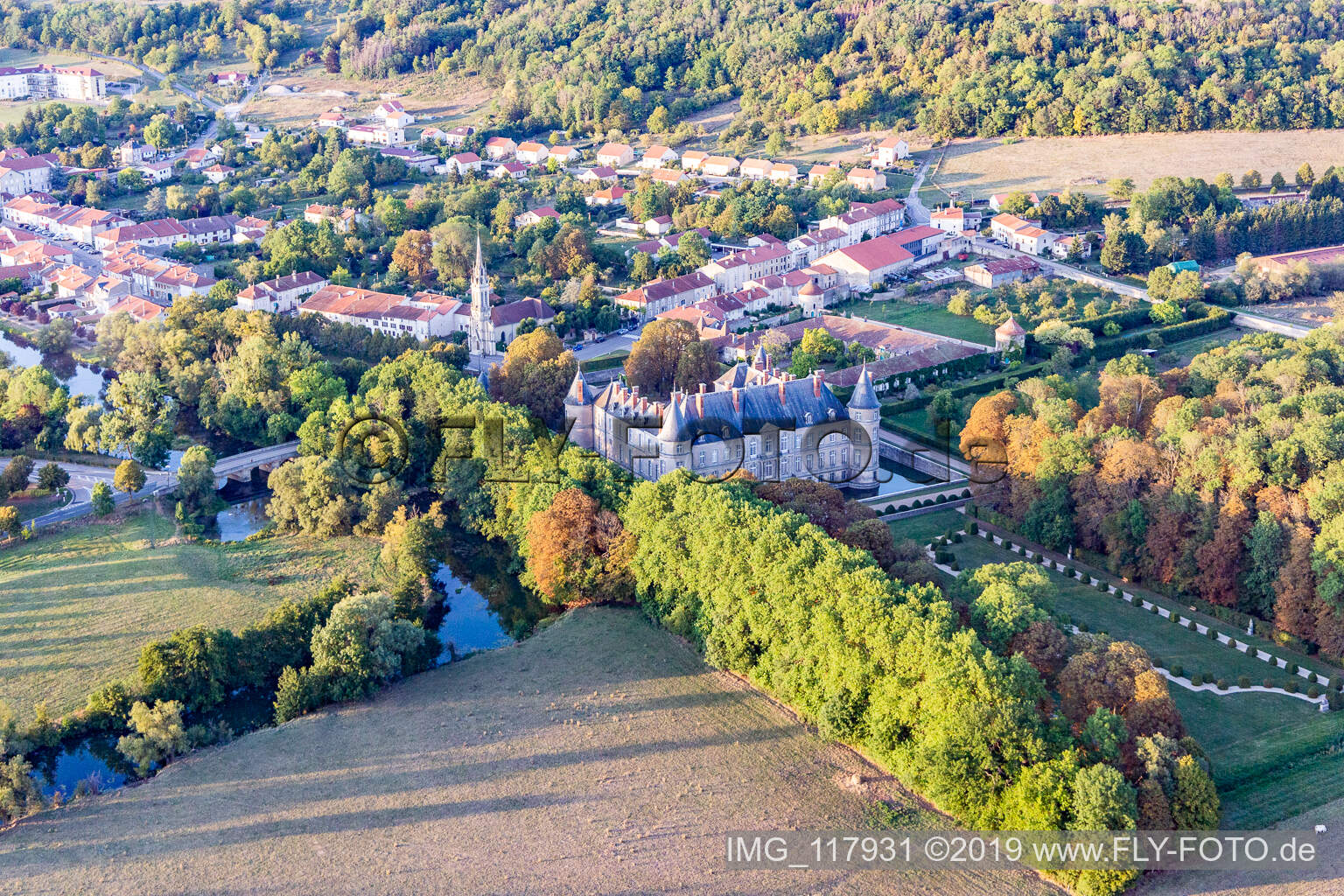Aerial photograpy of Building and castle park systems of water castle Chateau d'Haroue in Haroue in Grand Est, France