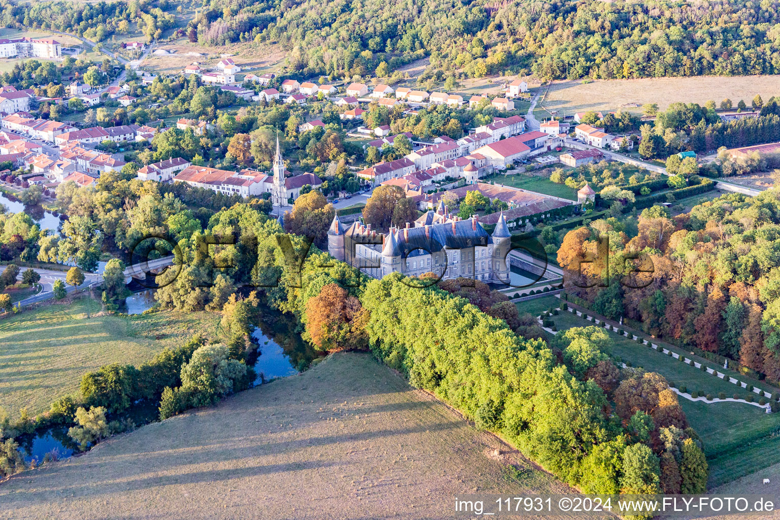 Aerial photograpy of Building and castle park systems of water castle Chateau d'Haroue in Haroue in Grand Est, France