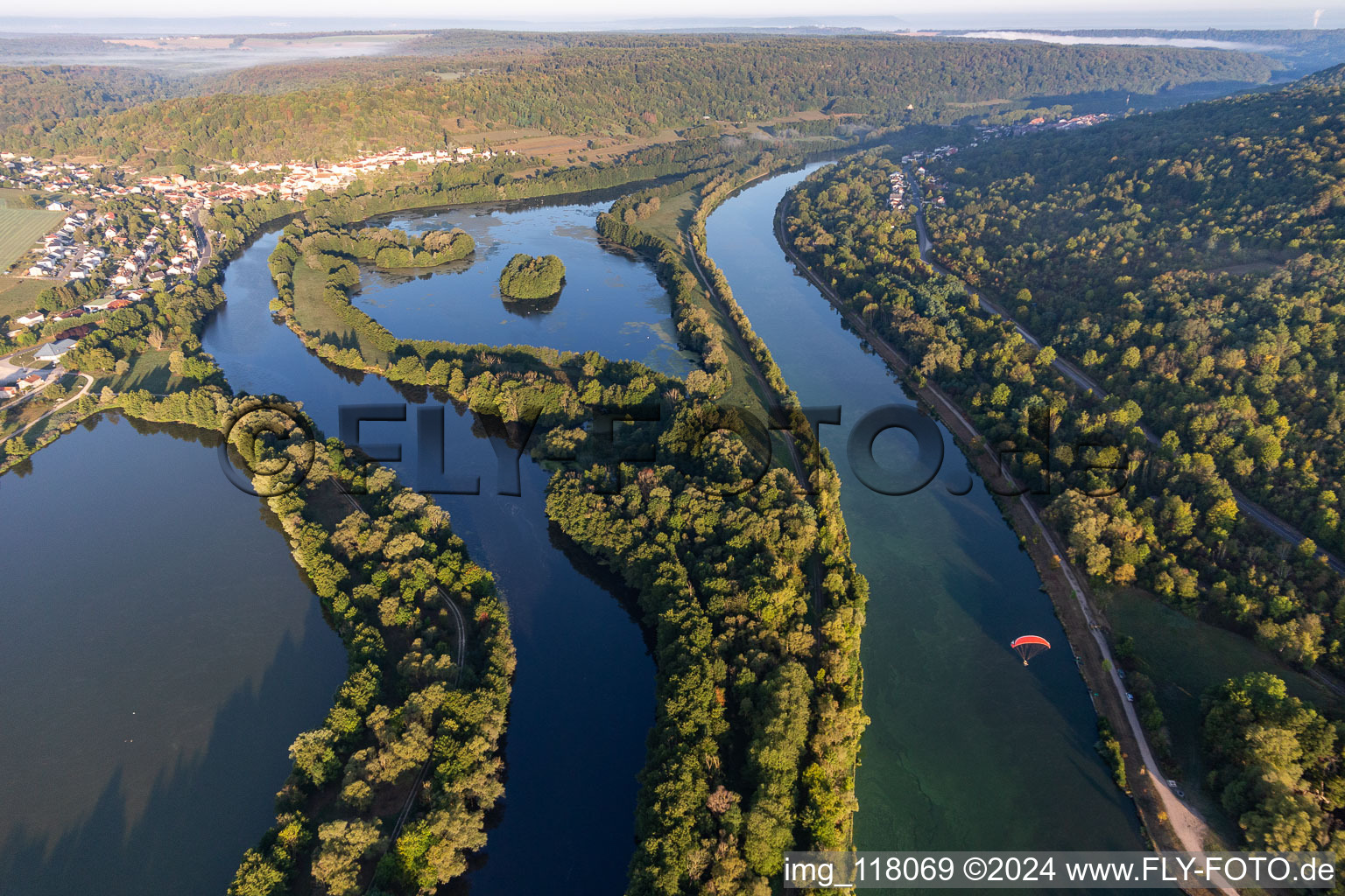 Island on the banks of the river course between Mosel and Canal de l'Est in Chaligny in Grand Est, France