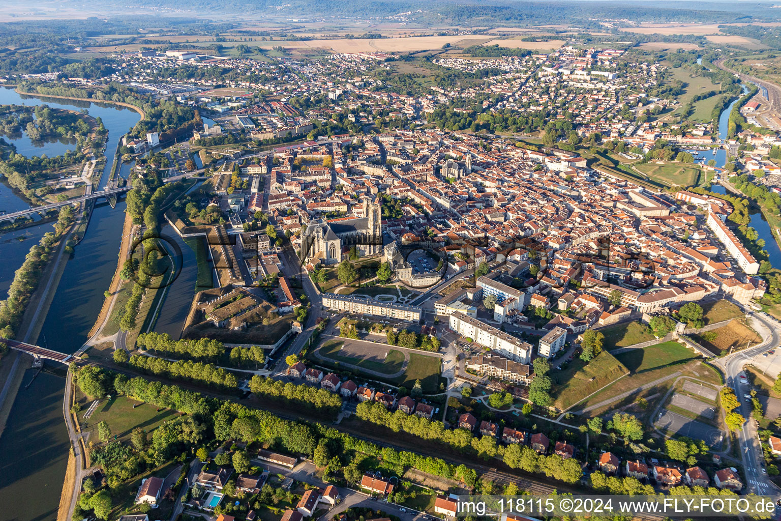 Aerial view of City center in the downtown area on the banks of river course Mosel in Toul in Grand Est, France