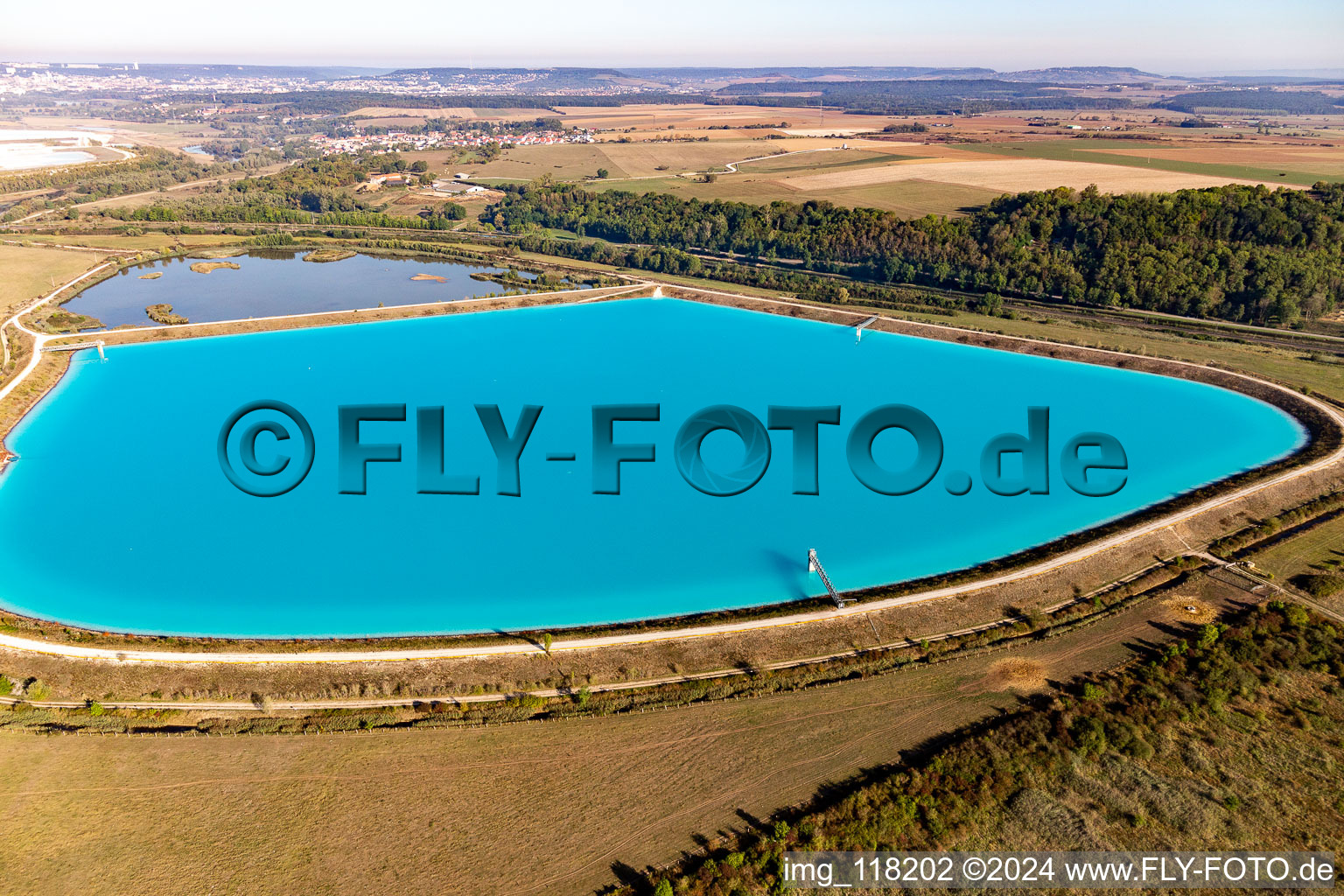 Turquoise-blue saltworks for the potash extraction of the Compagnie des Salins du Midi et des Salines de l'Est SA in Laneuveville-devant-Nancy in Grand Est, France