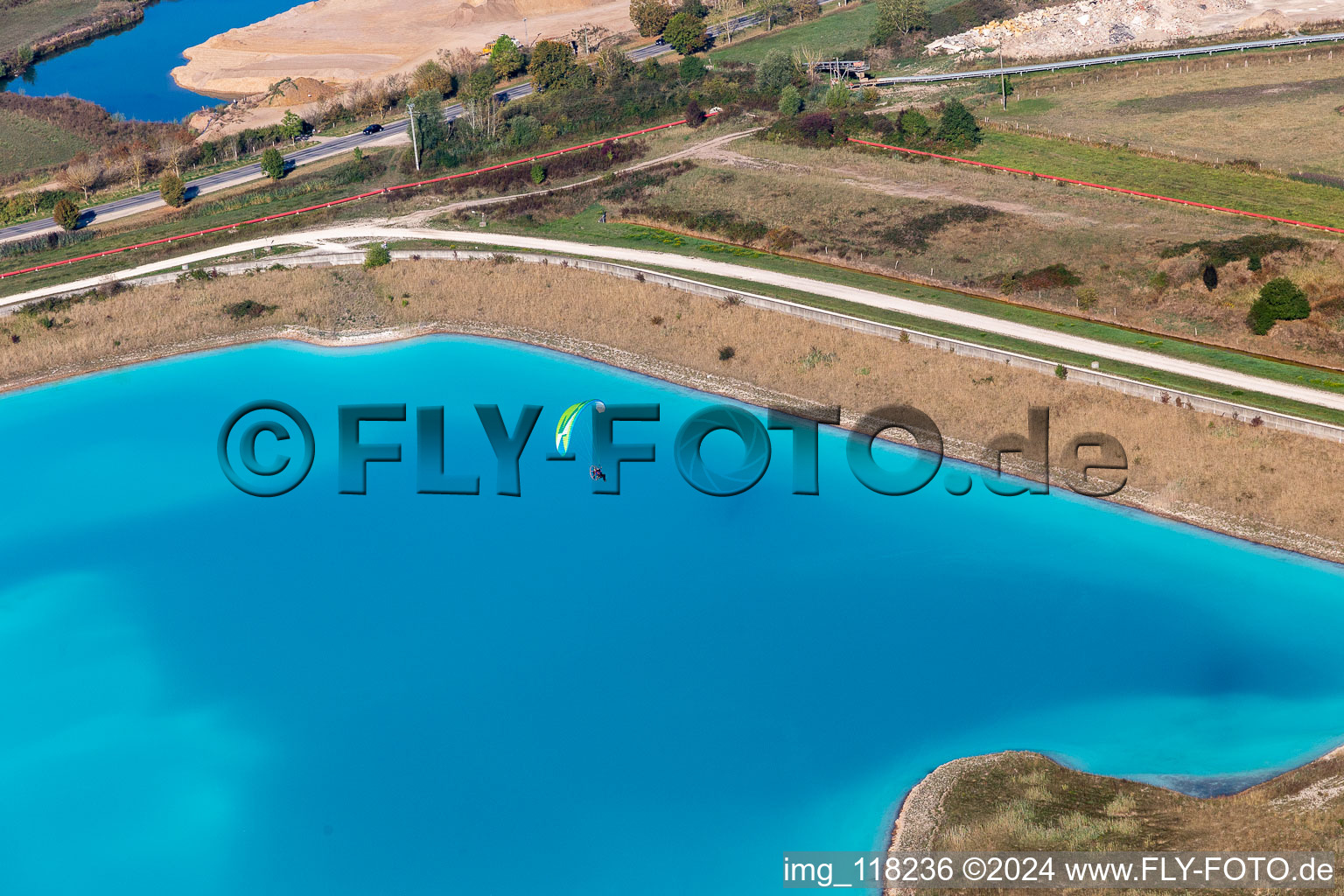 Brown - white salt pans for salt extraction in RosiA?res-aux-Salines in Alsace-Champagne-Ardenne-Lorraine, France viewn from the air