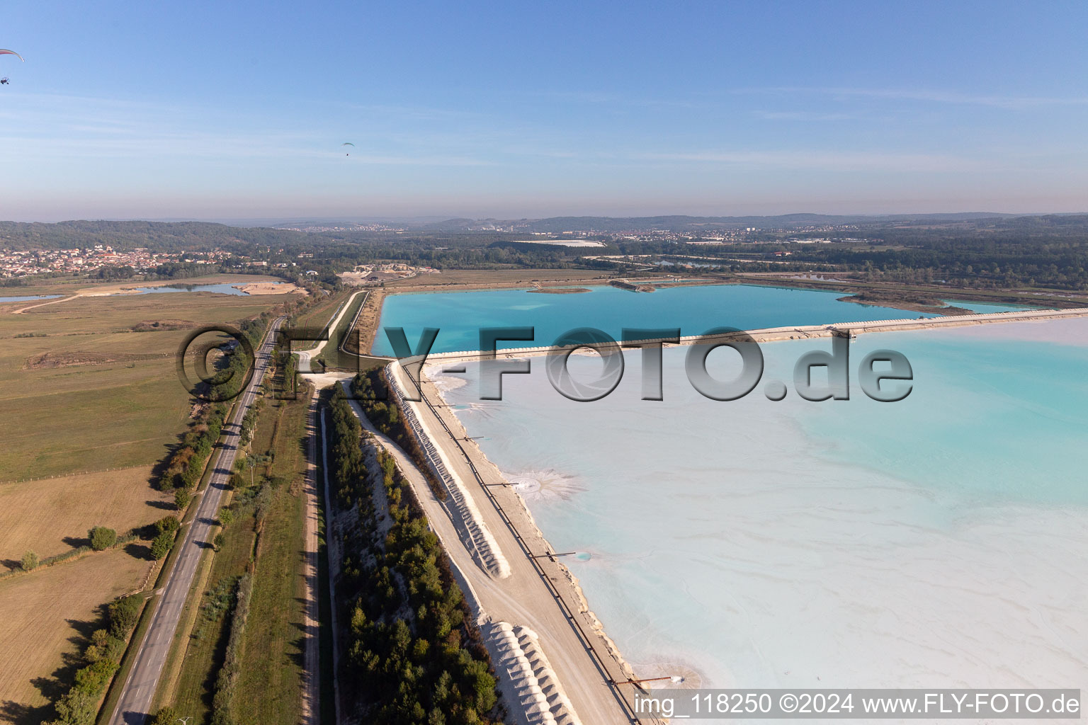 Turquoise-blue saltworks for the potash extraction of the Compagnie des Salins du Midi et des Salines de l'Est SA in Vigneulles in Grand Est, France