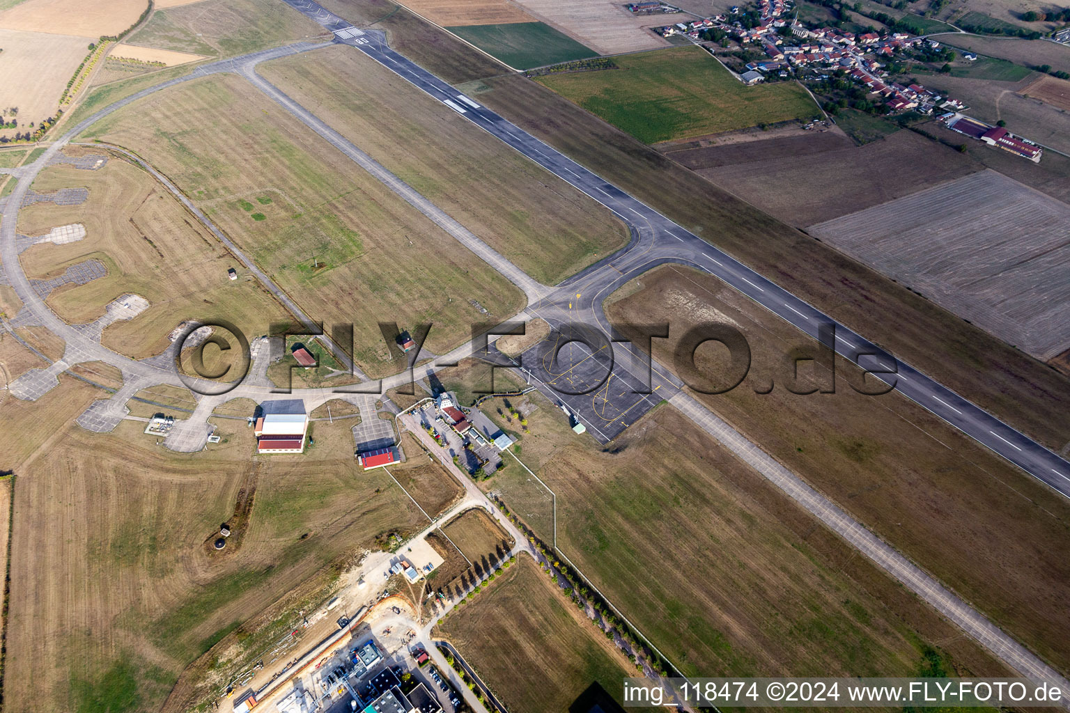 Runway with tarmac terrain of airfield Aeroport d'Epinal - Mirecourt in Juvaincourt in Grand Est, France