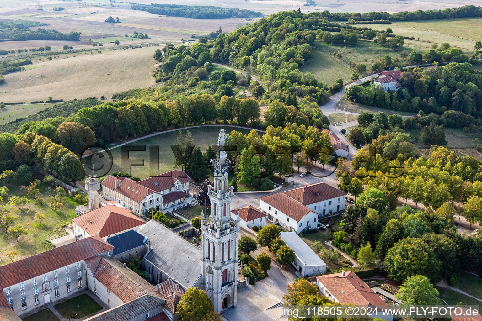 Aerial view of Church tower and tower roof at the church building of Basilique Notre-Dame de Sion in Saxon-Sion in Grand Est, France